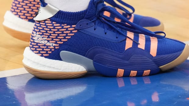 View of Trae Young's blue and orange shoes.